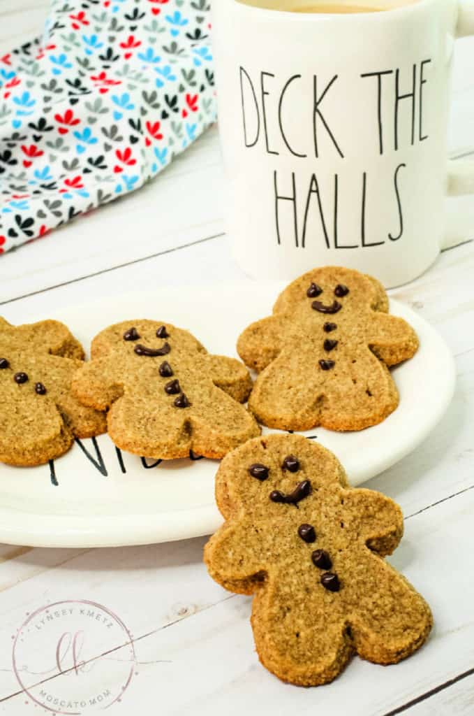 four keto gingerbread cookies with coffee