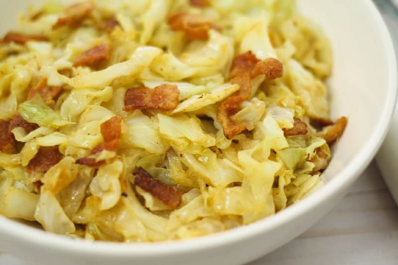 close up bacon fried cabbage