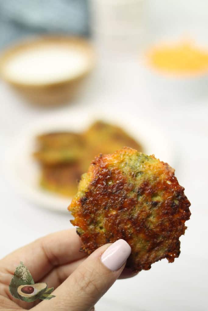 broccoli fritter held by womans hand